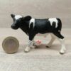 Schleich - 13798 bzw. WWF Nr 17072 Kalb, Schwarzbunt (Fähnchen)