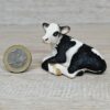 Schleich – 13639 Kalb Schwarzbunt, liegend