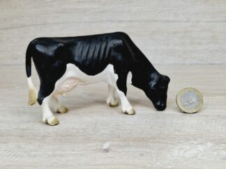 Schleich – 13141 Kuh Schwarzbunt, grasend