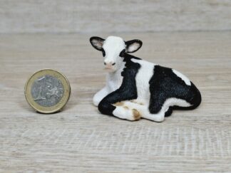 Schleich – 13639 Kalb Schwarzbunt, liegend