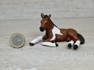 Schleich - Mc-D. Pinto Fohlen, liegend