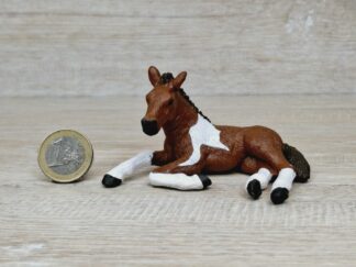 Schleich - Mc-D. Pinto Fohlen, liegend