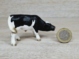 Schleich – 13615 Kalb Schwarzbunt, saugend