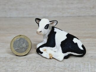Schleich – 13639 Kalb Schwarzbunt, liegend