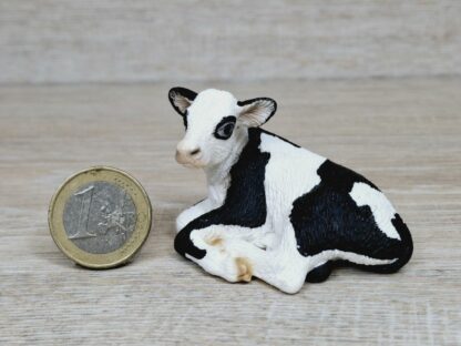 Schleich – 13639 Kalb Schwarzbunt, liegend