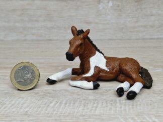 Schleich - Mc-D. Pinto Fohlen, liegend