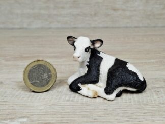 Schleich – 13639 Kalb Schwarzbunt, liegend