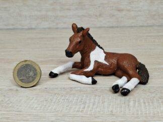 Schleich - Mc-D. Pinto Fohlen, liegend